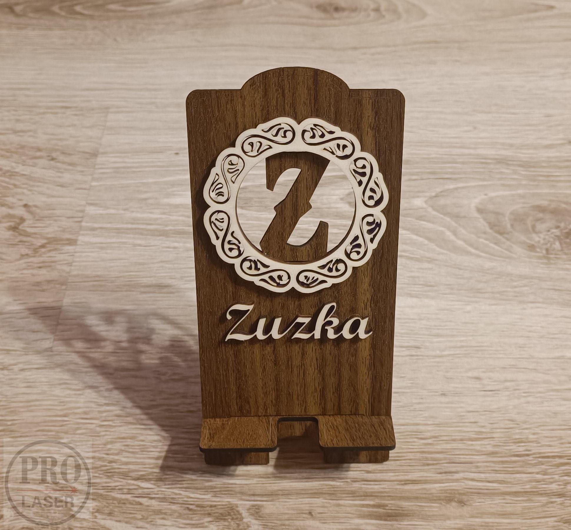 Stojánek na telefon s písmenem